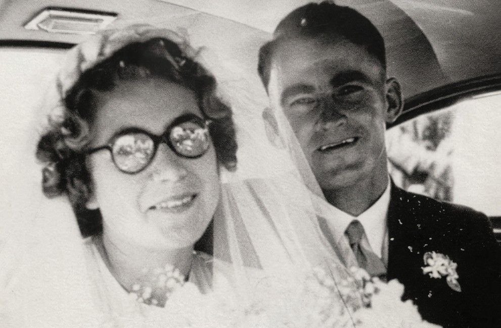Murray John Telfer and Shirley Edna Parker on their wedding day, 18 February 1950, in the car after the ceremony at Prospect Church of Christ